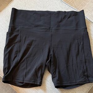Athleta Black High-Rise Bike Shorts with Side Pockets